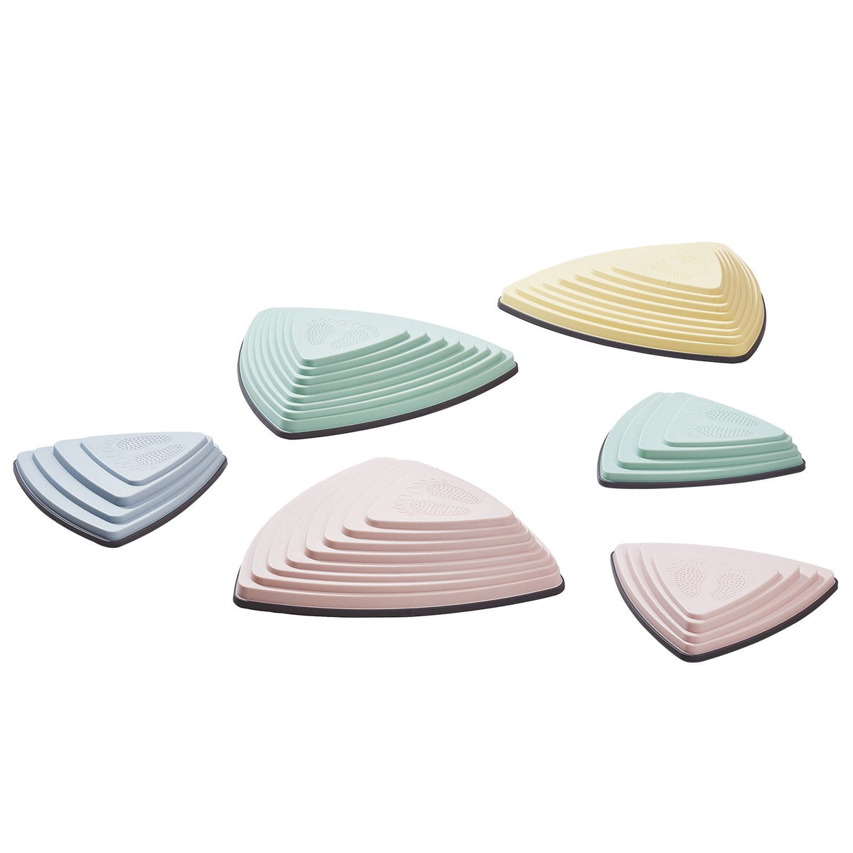 Six pastel balance stepping stones arranged on a white background, showing their raised textured surfaces.