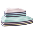 Six pastel balance stepping stones stacked together for compact storage.